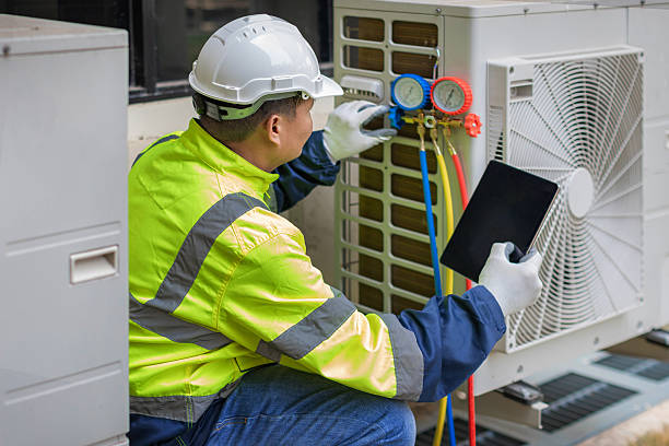 Professional Air Conditioning Repair technician working in Bryant, IN